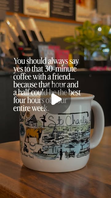 A St. Charles community mug inside a coffee shop