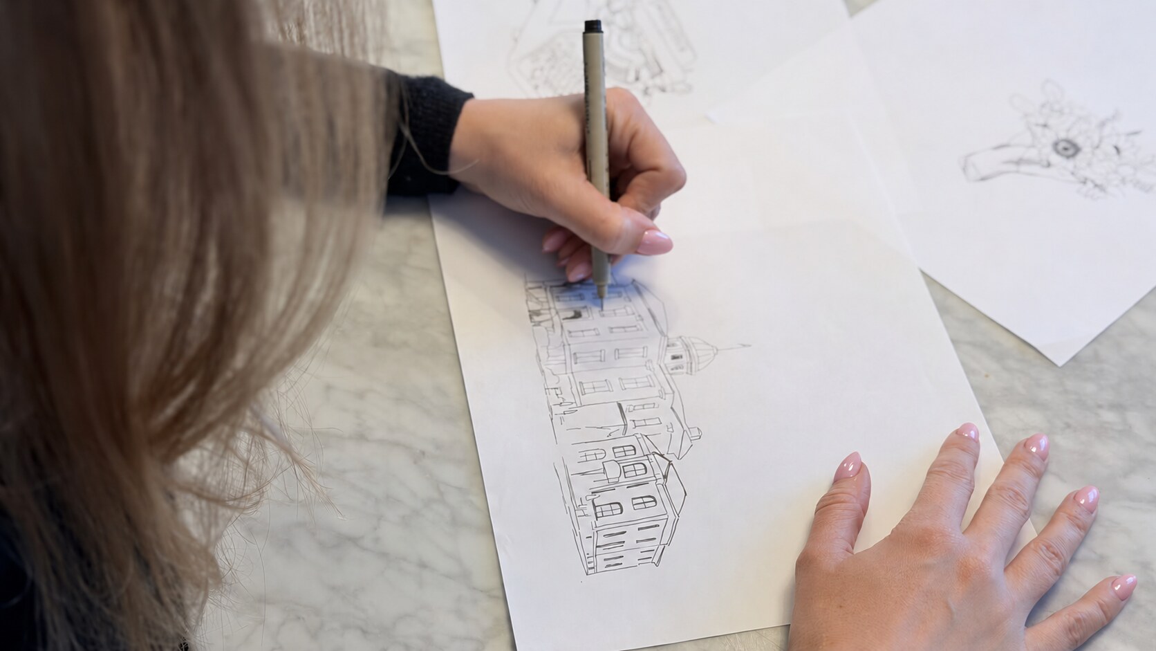 Hand-Drawn vs. Mass-Produced Souvenir Mugs